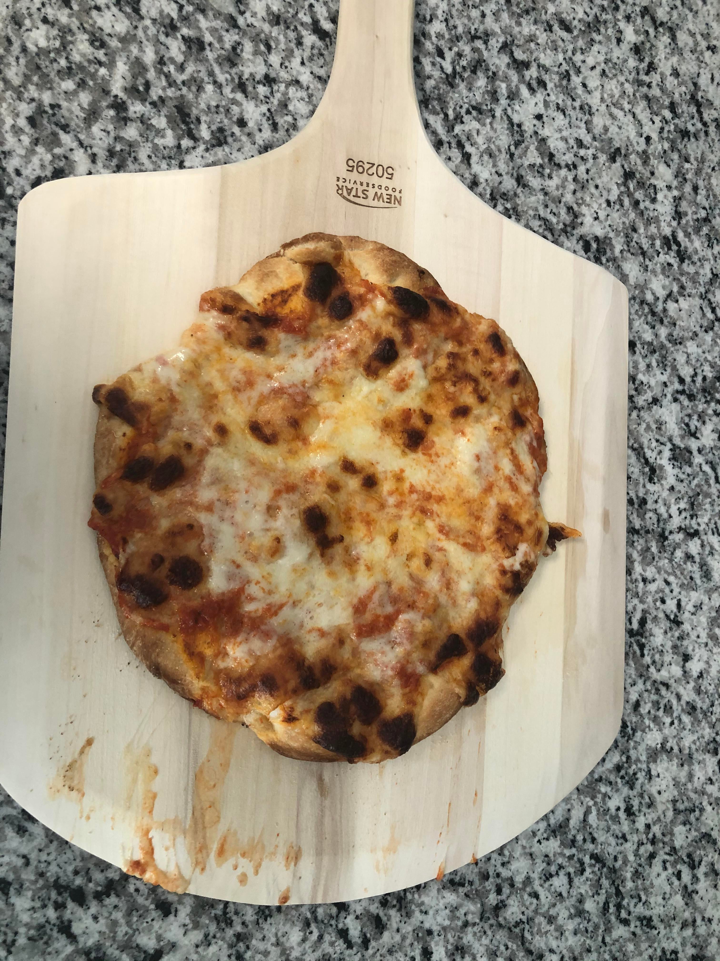 First time making my own pizza dough and using a pizza stone Dining and Cooking