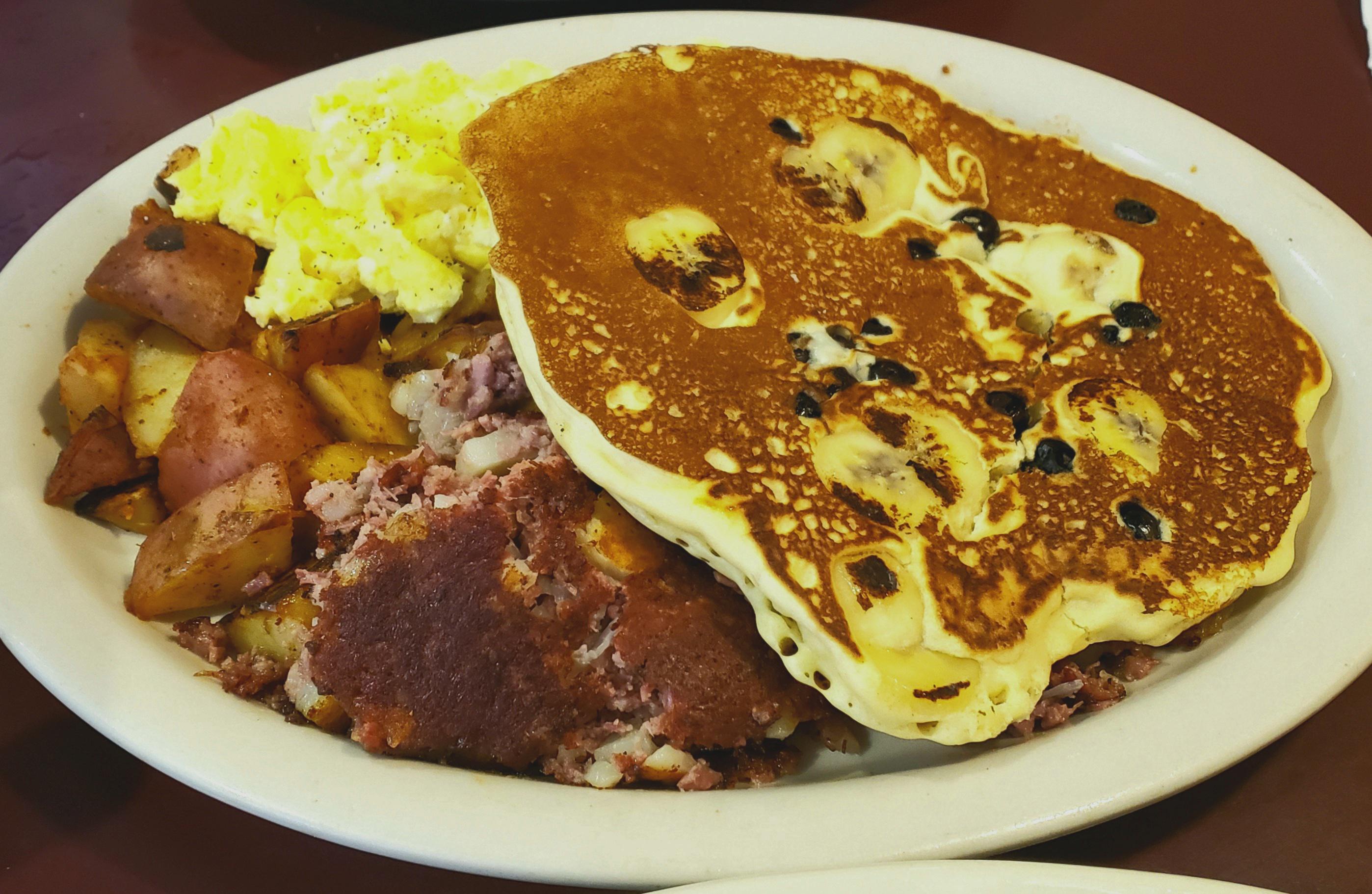 I Ate Bailey S Big Breakfast Blueberry Banana Pancakes Rosemary Potatoes Corned Beef Hash And Scrambled Eggs With Crumbled Feta Goldman S Deli Key West Fl Dining And Cooking