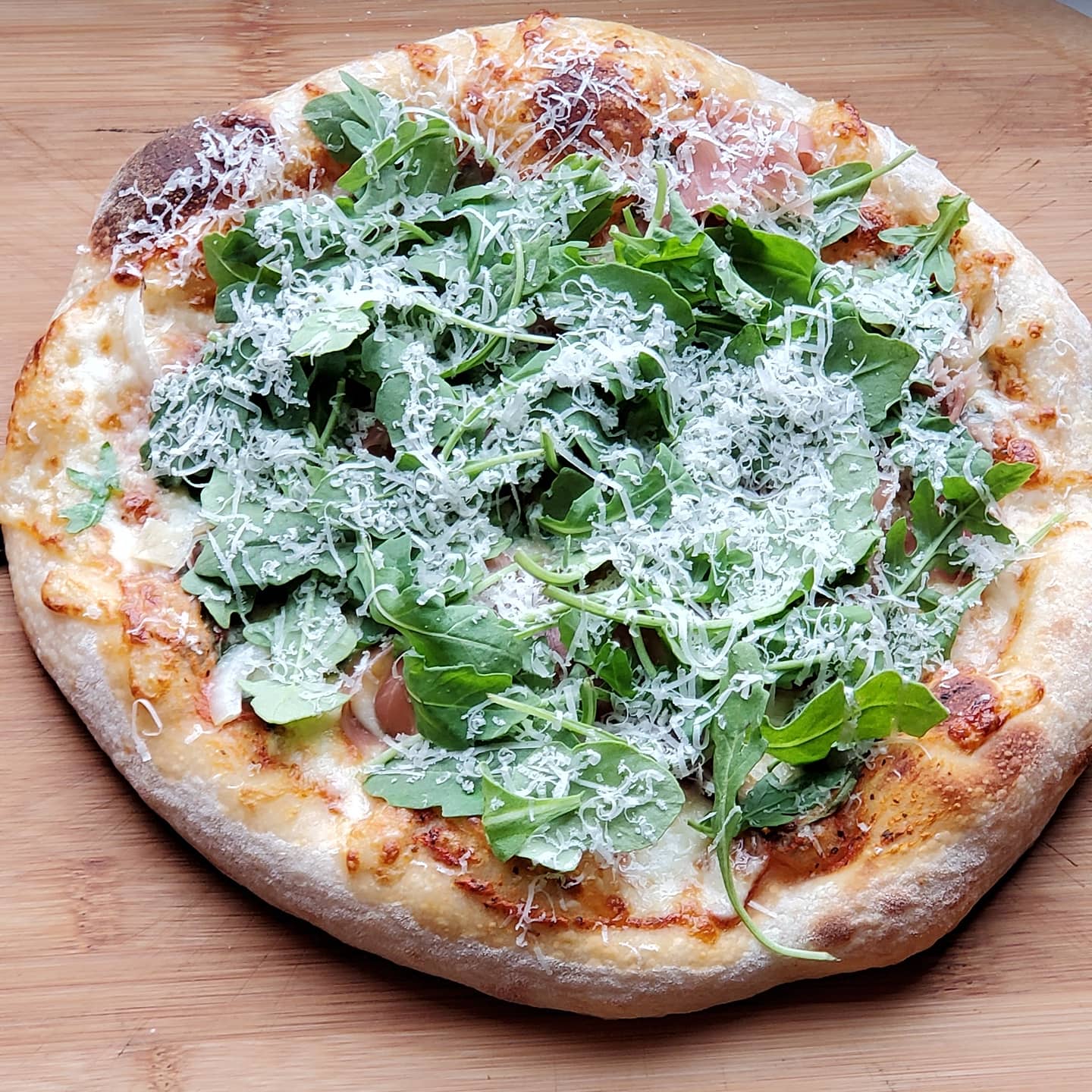 Prosciutto and arugula on sourdough crust - Dining and Cooking