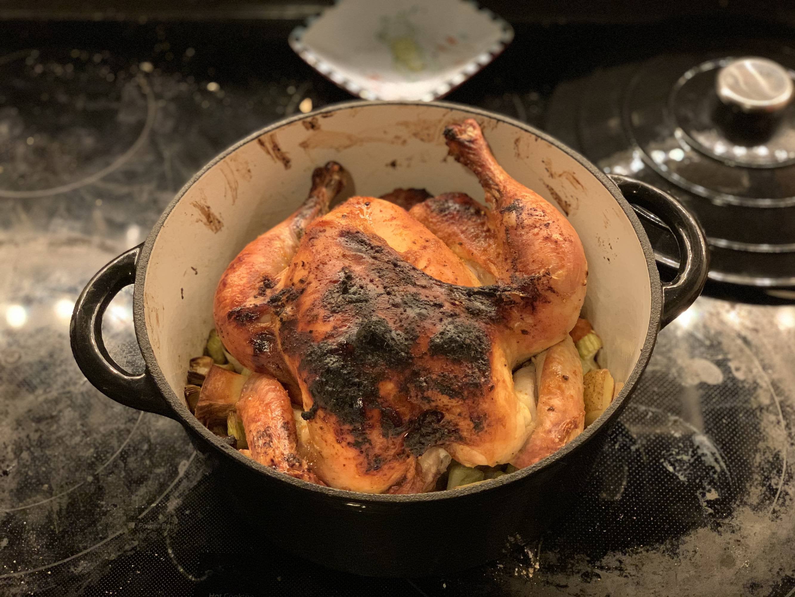 Breaking In A New Dutch Oven With Roasted Chicken Over Carrots Onion