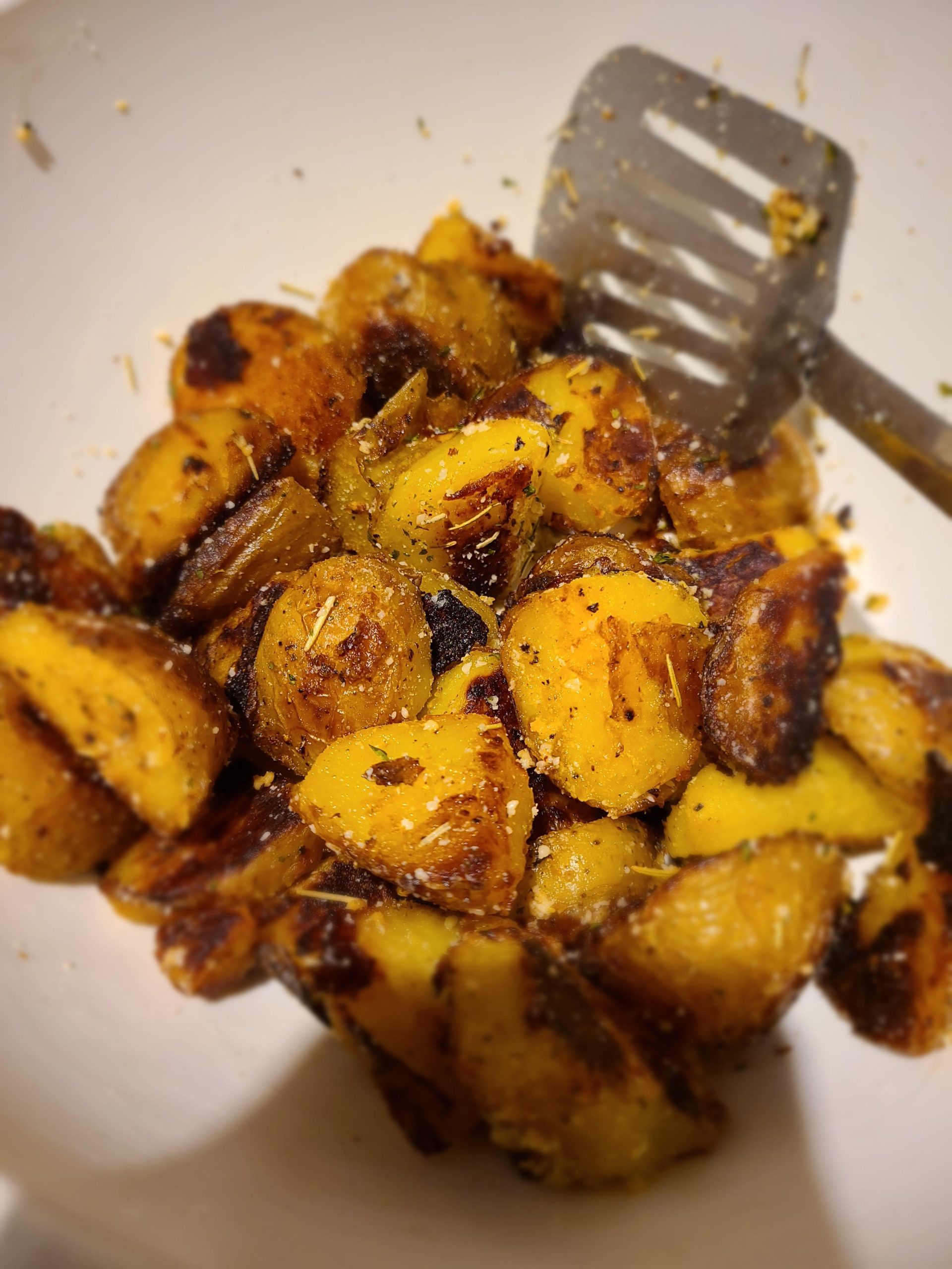 crispy-roast-yukon-gold-potatoes-with-rosemary-garlic-and-parmesan