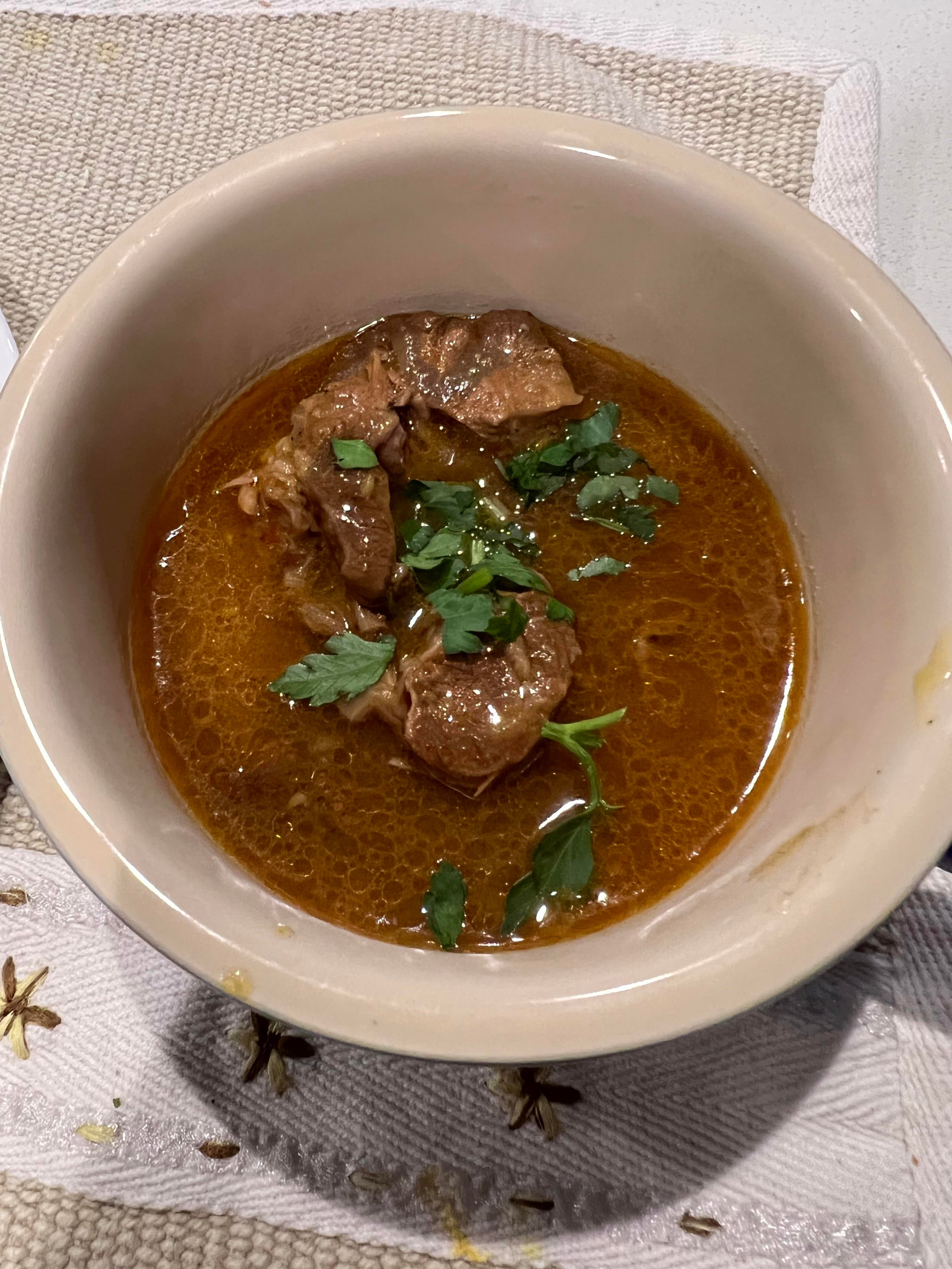Pakistani beef stew- Nihari. Slow cooked beef shank. Served with naan ...
