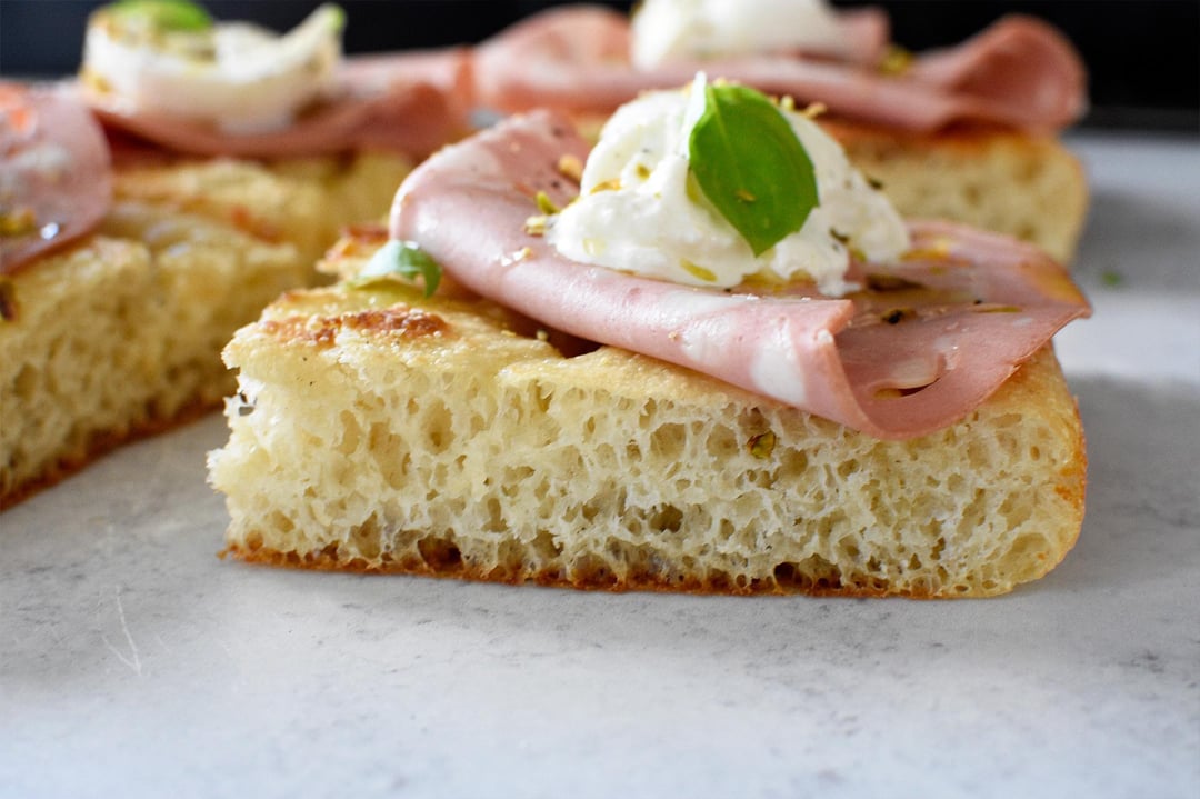 Focaccia with mortadella, burrata, pistachio, basil, EVOO, sea salt ...