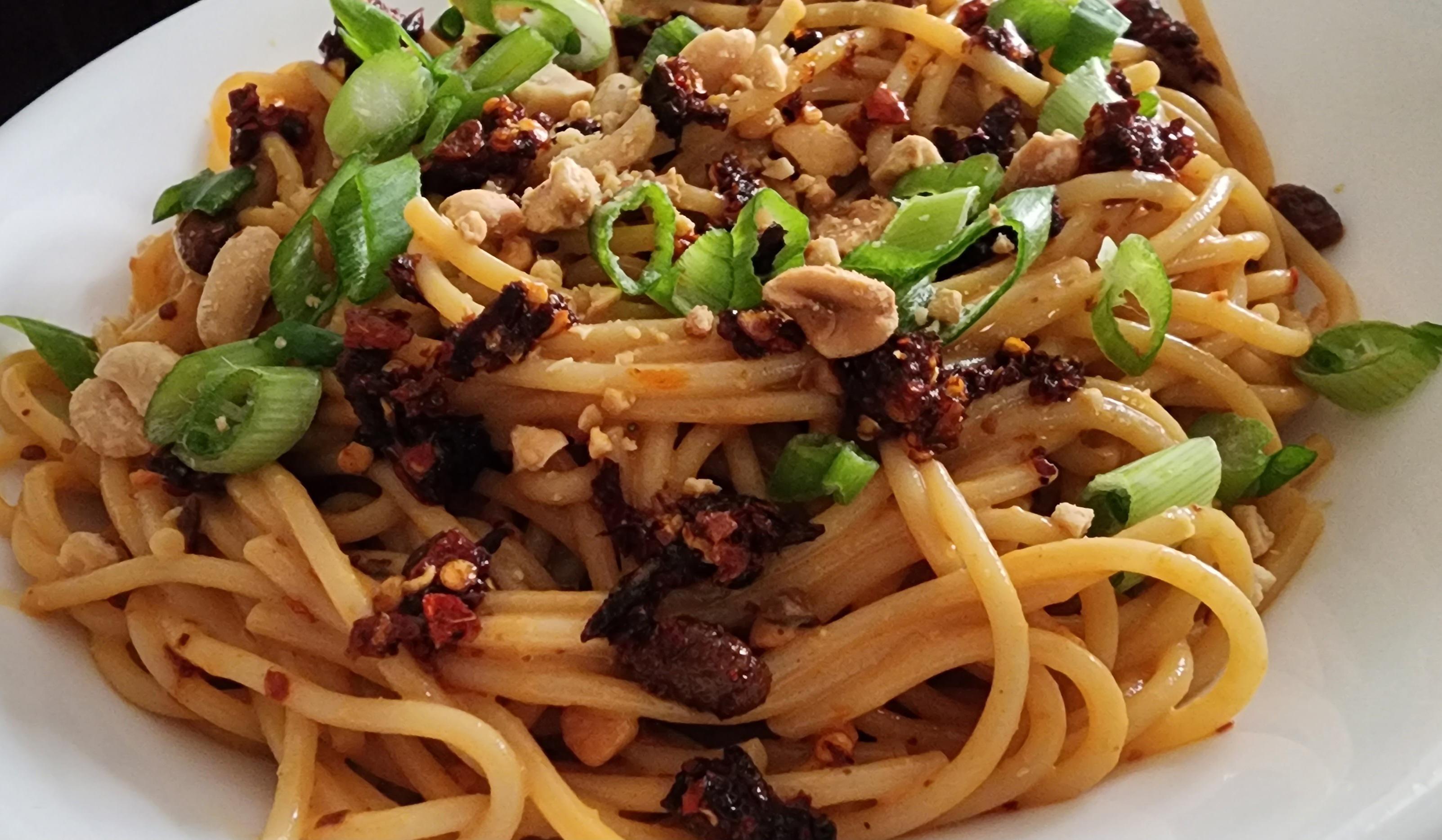 Peanut Chili Crisp Pasta with Green Onions Dining and Cooking