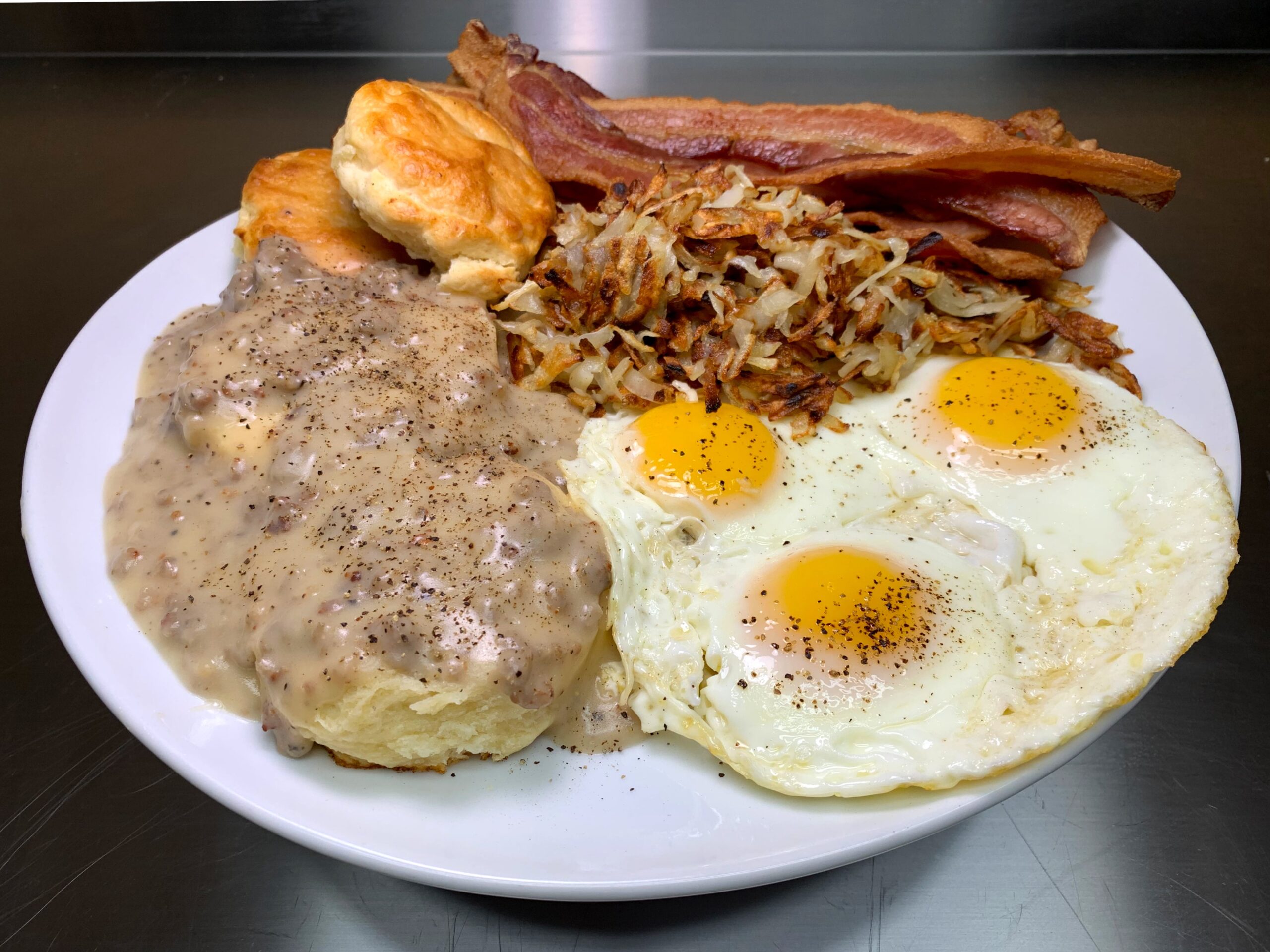 Biscuits and Gravy, Bacon, Eggs, Hash Browns Scattered - Dining and Cooking