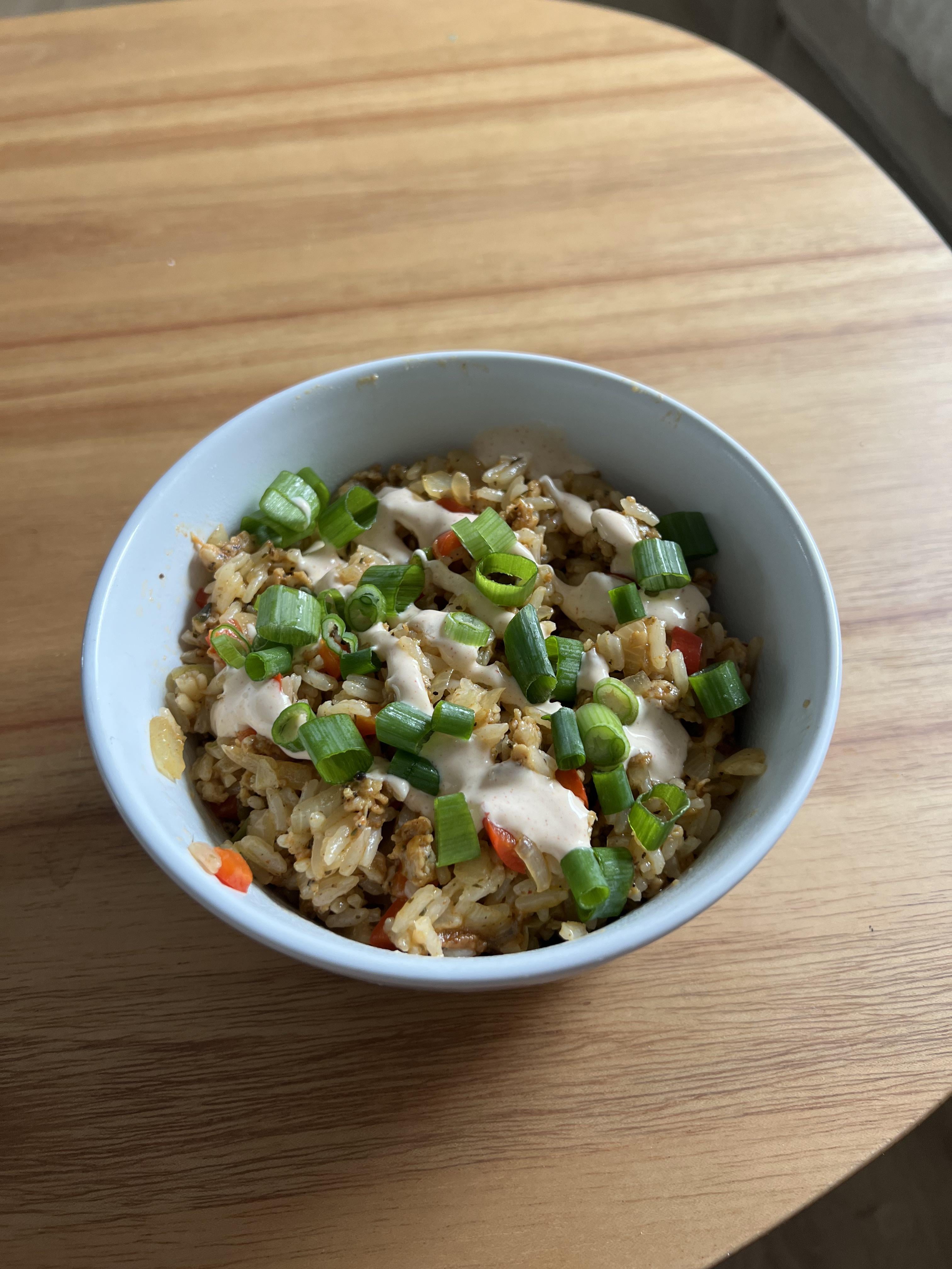 Cajun-Style Chicken Dirty Rice with Smoky Red Pepper Crema - Dining and ...